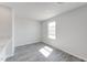 Dining area featuring natural light and wood-look flooring at 176 Lillian Ct, Roxboro, NC 27573