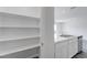 Kitchen pantry features ample shelving for plenty of accessible storage space at 176 Lillian Ct, Roxboro, NC 27573