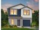 Charming two-story home with a front-entry garage and stylish siding at 213 Landon Pl, Roxboro, NC 27573