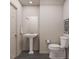 Classic half bathroom with modern neutral color scheme at 213 Landon Pl, Roxboro, NC 27573
