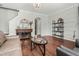 Elegant living room featuring hardwood floors, stylish decor, and plenty of natural light at 218 Darecrest Ln, Wendell, NC 27591