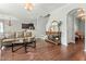 Comfortable living room with hardwood floors seamlessly flowing into the dining area at 218 Darecrest Ln, Wendell, NC 27591