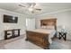 Spacious main bedroom featuring a ceiling fan and a walk-in closet at 218 Darecrest Ln, Wendell, NC 27591