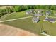Aerial view of the home in a neighborhood setting on an oversized lot at 241 Connelly Way, Zebulon, NC 27597