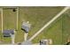 Aerial view showcasing the home's extensive fenced-in backyard and neighborhood at 241 Connelly Way, Zebulon, NC 27597