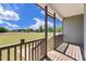 Back porch shows a picturesque view of green pastures at 241 Connelly Way, Zebulon, NC 27597