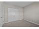 Neutral bedroom features a carpet floor, closet, and fresh paint at 241 Connelly Way, Zebulon, NC 27597
