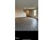 Spacious living room with wood-look floors and natural light from a window at 249 Landon Pl, Roxboro, NC 27573