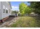 This backyard features a stone path to a deck at 2808 Polesdon Ct, Raleigh, NC 27615