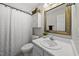 This bathroom features a toilet, shower and vanity at 2808 Polesdon Ct, Raleigh, NC 27615