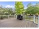 This deck features a grill and a fenced in yard at 2808 Polesdon Ct, Raleigh, NC 27615