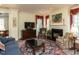 Inviting living room featuring a fireplace, TV, a comfortable couch, and rich textures for ultimate relaxation at 2813 Market Bridge Ln # 204, Raleigh, NC 27608