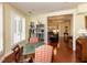 Inviting sitting area with built-in bookshelves, hardwood floors, and large windows offering plenty of natural light at 2813 Market Bridge Ln # 204, Raleigh, NC 27608