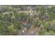 Aerial view of a home nestled in a community with golf course and lush trees at 3011 Bourbon St, Sanford, NC 27332