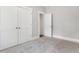 Bedroom featuring neutral walls, carpeted floors, and two large closets at 3011 Bourbon St, Sanford, NC 27332
