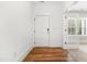 Clean entryway with classic white five-panel door and detailed white trim at 3011 Bourbon St, Sanford, NC 27332