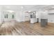 Open concept living area featuring recessed lighting, light colored walls and hard wood floors at 3011 Bourbon St, Sanford, NC 27332
