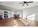 Open concept dining area featuring laminate floors, fresh neutral paint, and abundant natural light at 305 Gillis Rd, Roxboro, NC 27574