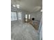Bright dining area and living room with fireplace at 308 Caroline Dr, Wendell, NC 27591
