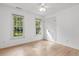 Bedroom with wood floors, natural light, and a ceiling fan at 308 Sunset Creek Cir, Chapel Hill, NC 27516