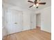 Bedroom with wood flooring, double closet, and bright natural light at 308 Sunset Creek Cir, Chapel Hill, NC 27516