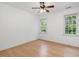 Bedroom featuring wood flooring, natural light, and a ceiling fan at 308 Sunset Creek Cir, Chapel Hill, NC 27516