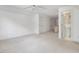 Bright bedroom features a ceiling fan, with neutral paint, carpet, and multiple closets at 308 Sunset Creek Cir, Chapel Hill, NC 27516