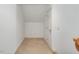 Small closet features a carpeted floor and one light switch at 308 Sunset Creek Cir, Chapel Hill, NC 27516