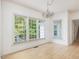 Dining room featuring large windows offering scenic outdoor views at 308 Sunset Creek Cir, Chapel Hill, NC 27516