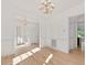 Spacious dining room featuring hardwood floors and elegant chandelier at 308 Sunset Creek Cir, Chapel Hill, NC 27516