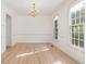 Formal dining room with hardwood floors, chandelier, and natural light at 308 Sunset Creek Cir, Chapel Hill, NC 27516