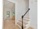 Classic foyer with hardwood floors, a staircase, and an open doorway to the kitchen at 308 Sunset Creek Cir, Chapel Hill, NC 27516