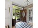 Bright foyer features a checkered tile entry, wood floors, and a view to the yard at 308 Sunset Creek Cir, Chapel Hill, NC 27516