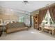 Spacious living room with futon and lots of natural light at 308 Sunset Creek Cir, Chapel Hill, NC 27516