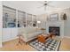 Comfortable living room with built-in shelving, fireplace, and hardwood floors at 308 Sunset Creek Cir, Chapel Hill, NC 27516