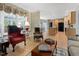 Bright living room features hardwood floors flowing seamlessly into the eat-in kitchen at 308 Sunset Creek Cir, Chapel Hill, NC 27516