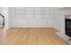Living room featuring hardwood floors, built-in shelving, and a fireplace at 308 Sunset Creek Cir, Chapel Hill, NC 27516
