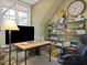 Home office featuring a desk, shelving, and lots of natural light at 308 Sunset Creek Cir, Chapel Hill, NC 27516
