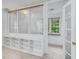 Room featuring built in bookshelves and large windows at 308 Sunset Creek Cir, Chapel Hill, NC 27516