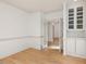 Study showcasing hardwood floors, built-in cabinets, and french doors at 308 Sunset Creek Cir, Chapel Hill, NC 27516
