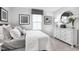 Bright bedroom featuring a white comforter, neutral walls, and carpet at 35 Boots Ridge Way, Franklinton, NC 27525