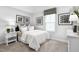 Cozy bedroom featuring soft carpet, neutral walls, and modern black and white decor at 35 Boots Ridge Way, Franklinton, NC 27525