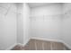Walk-in closet features neutral carpet and wire shelving for optimal storage at 35 Boots Ridge Way, Franklinton, NC 27525