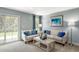 Charming living room featuring two couches with blue accent pillows and light blue walls at 35 Boots Ridge Way, Franklinton, NC 27525