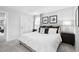 Spacious main bedroom featuring neutral décor, stylish curtains, and ample natural light at 35 Boots Ridge Way, Franklinton, NC 27525