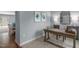 Stylish office featuring blue walls, a wood desk, and modern decorations at 35 Boots Ridge Way, Franklinton, NC 27525