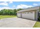 Three-car garage boasts ample parking space and a well-maintained exterior, with a long driveway for easy access at 3604 Stagecoach Rd, Durham, NC 27713