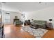 Spacious living room with hardwood floors and ample natural light at 3604 Stagecoach Rd, Durham, NC 27713