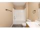 Bathroom with a shower-tub combo, toilet, vinyl flooring, and a single sink vanity at 3819 Valleydale Dr, Durham, NC 27703