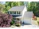 Charming two-story home with a front porch, attached garage, and well-maintained landscaping at 3819 Valleydale Dr, Durham, NC 27703